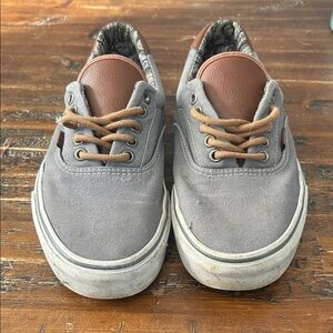 Gray and Brown vans Era